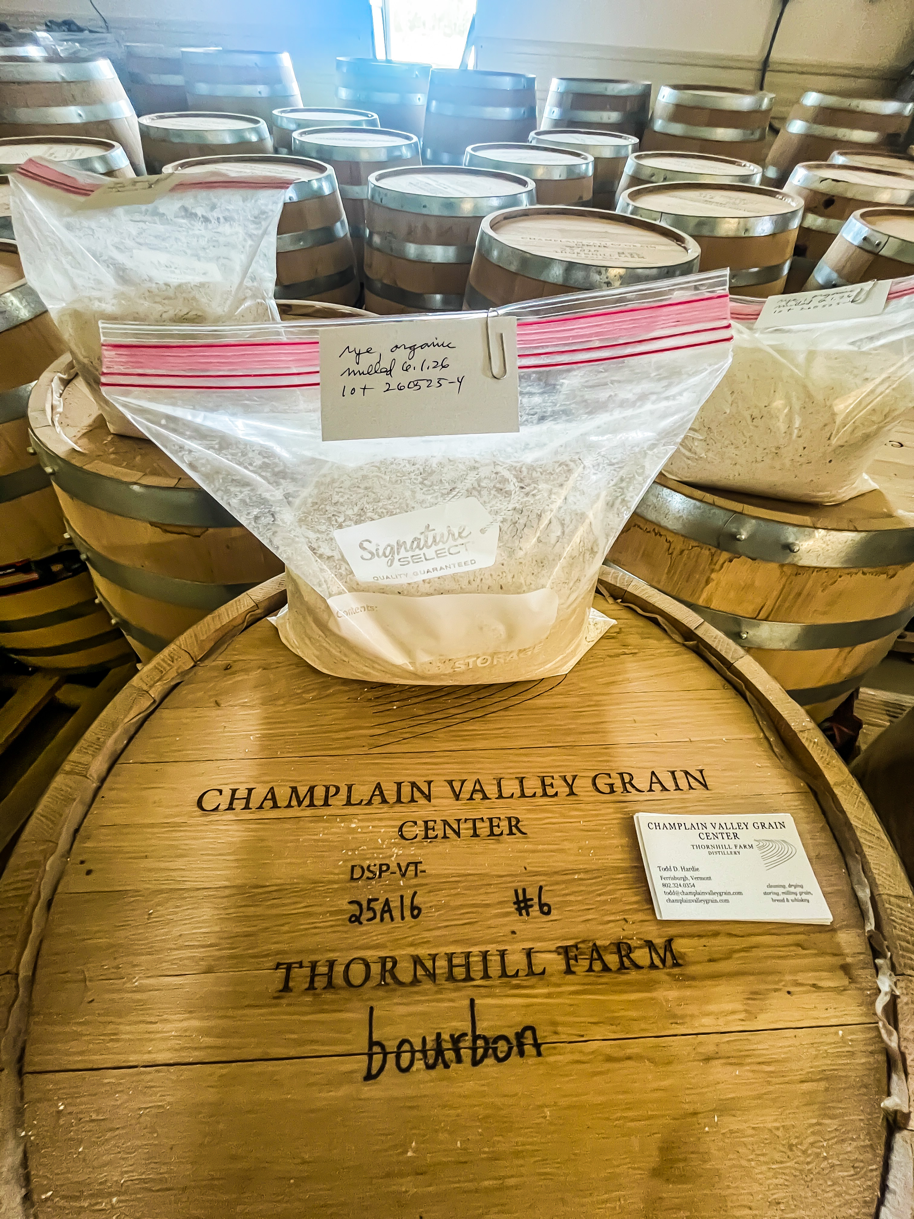 Barrels of bourbon made from locally-grown organic grains are shown aging in a warehouse at the Champlain Valley Grain Center