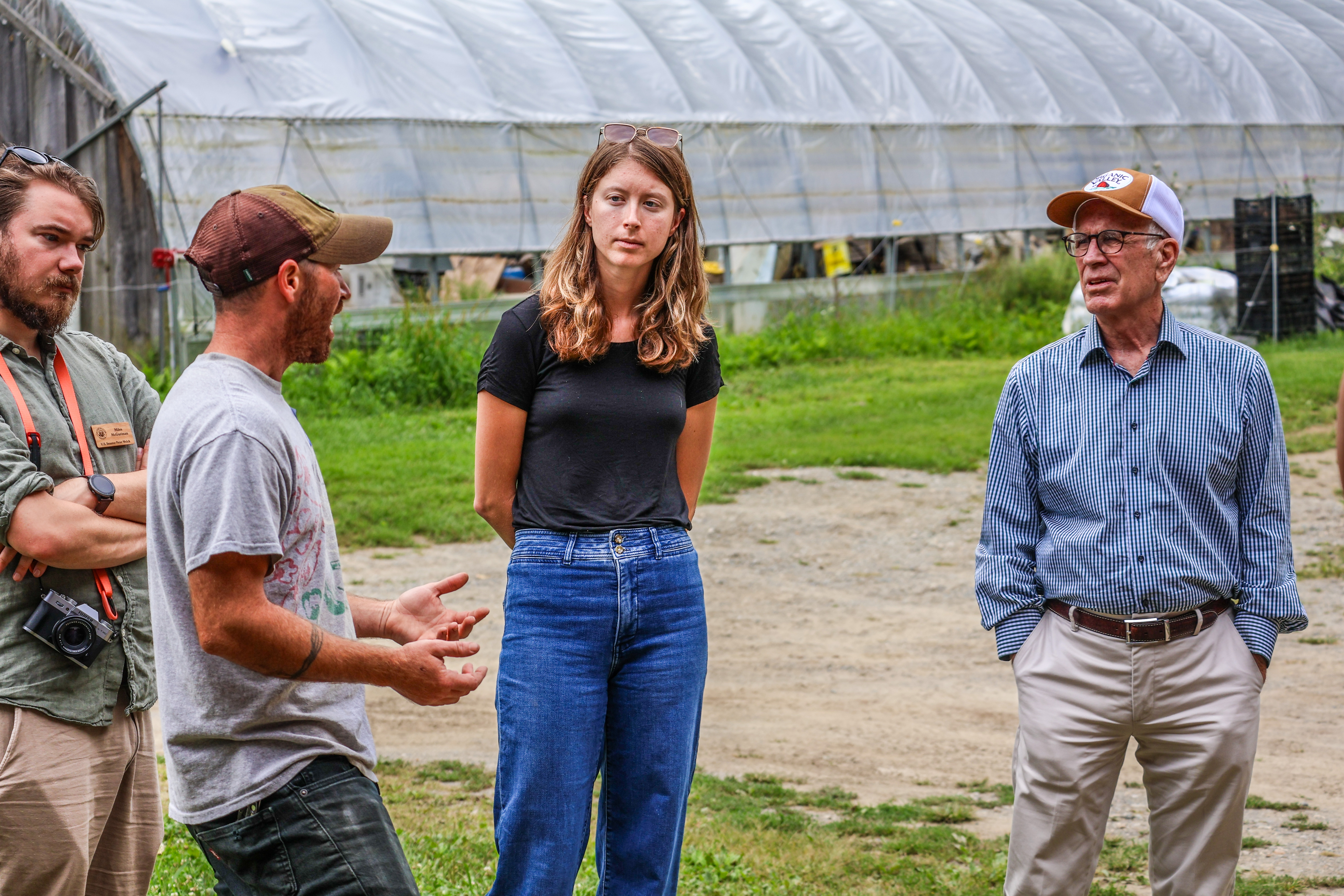 Eli Hersch of Honey Field Farm chats wtih Senator Welch and his staff