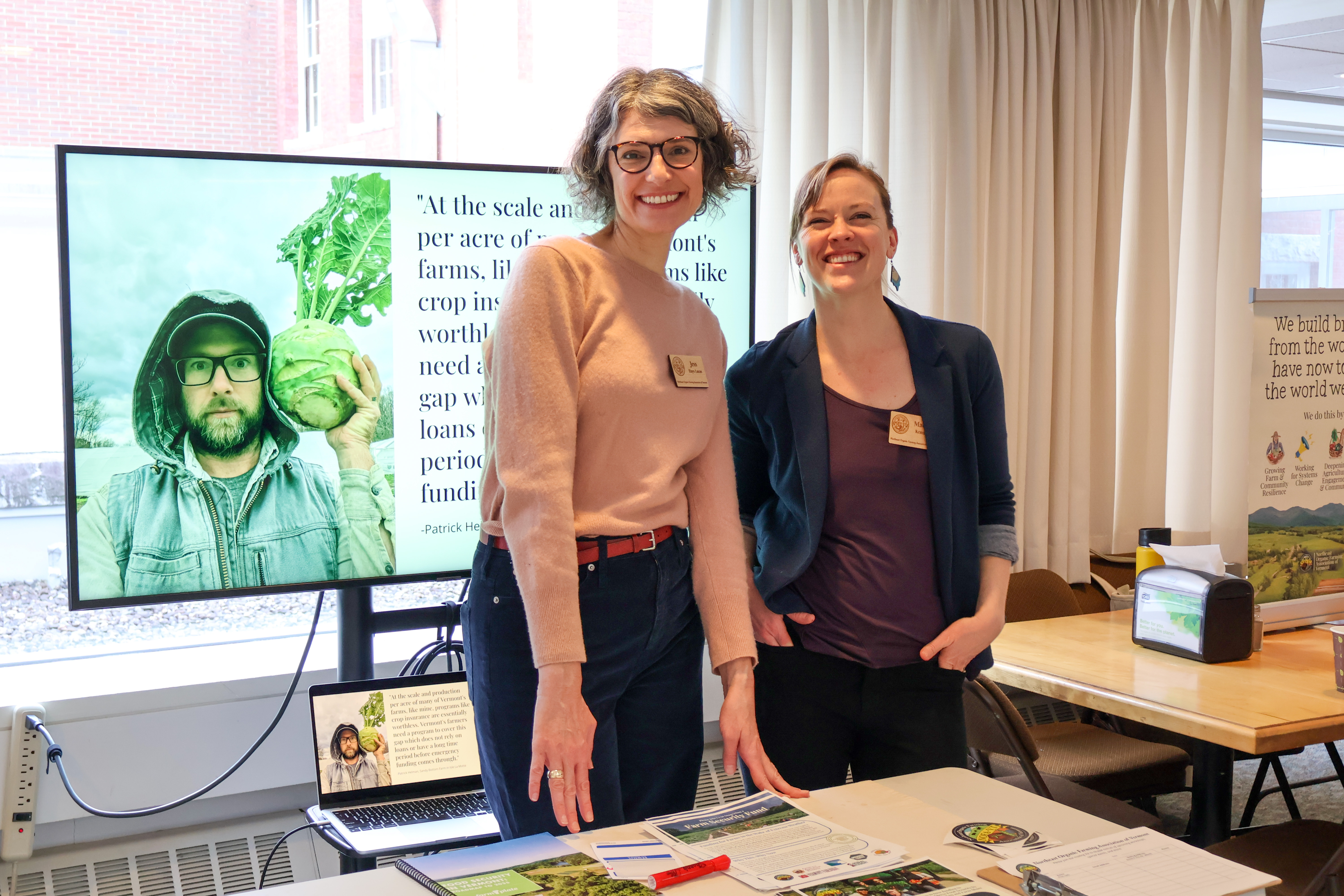 Jessica Hayes-Lucas, NOFA-VT Grassroots Organizer, and Maddie Kempner, NOFA-VT Policy and Organizing Director, table at a State House event this past spring in support of the Farm Security Fund