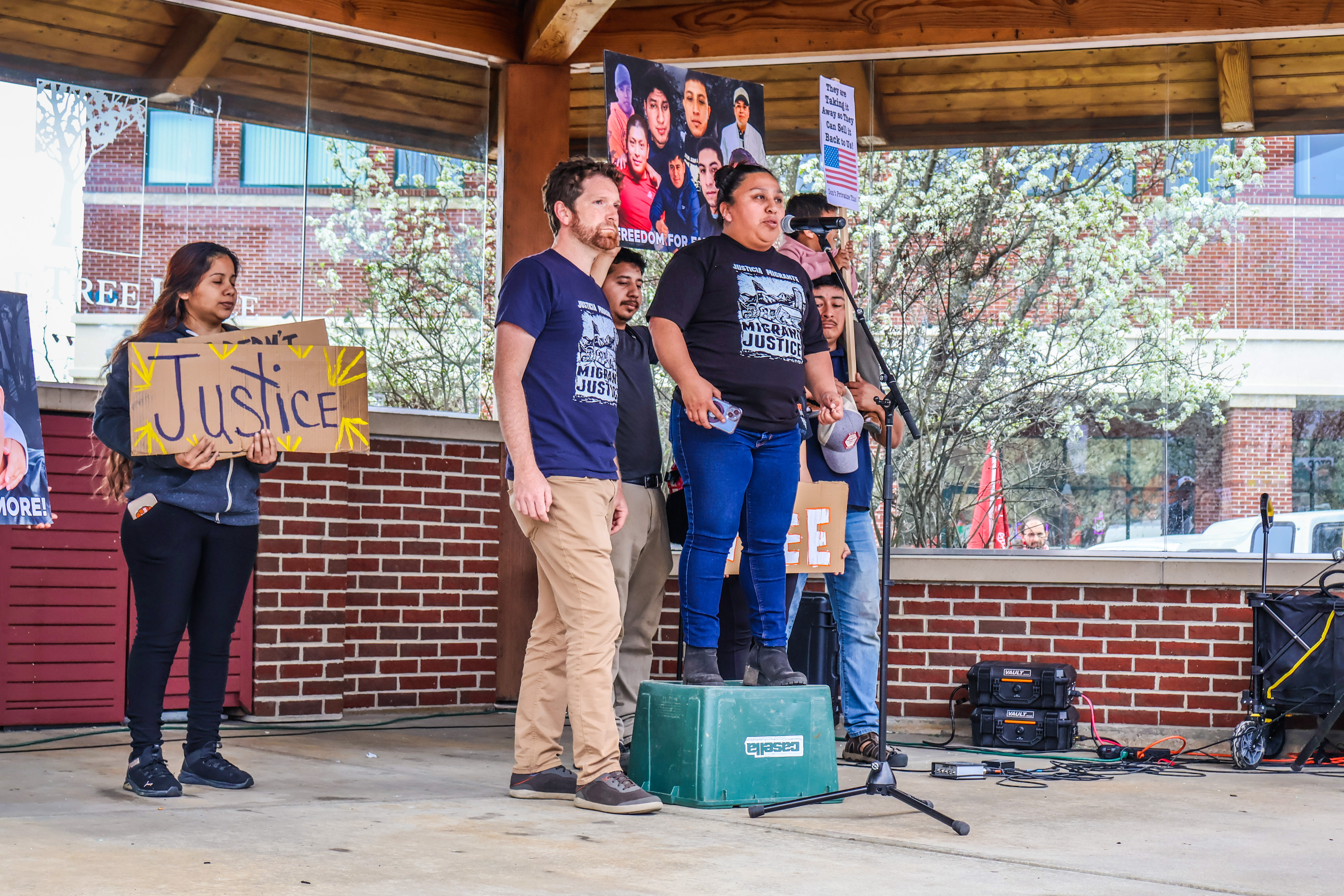 Organizers from Migrant Justice deliver an impassioned plea for farmworker support during a May Day protest in Burlington