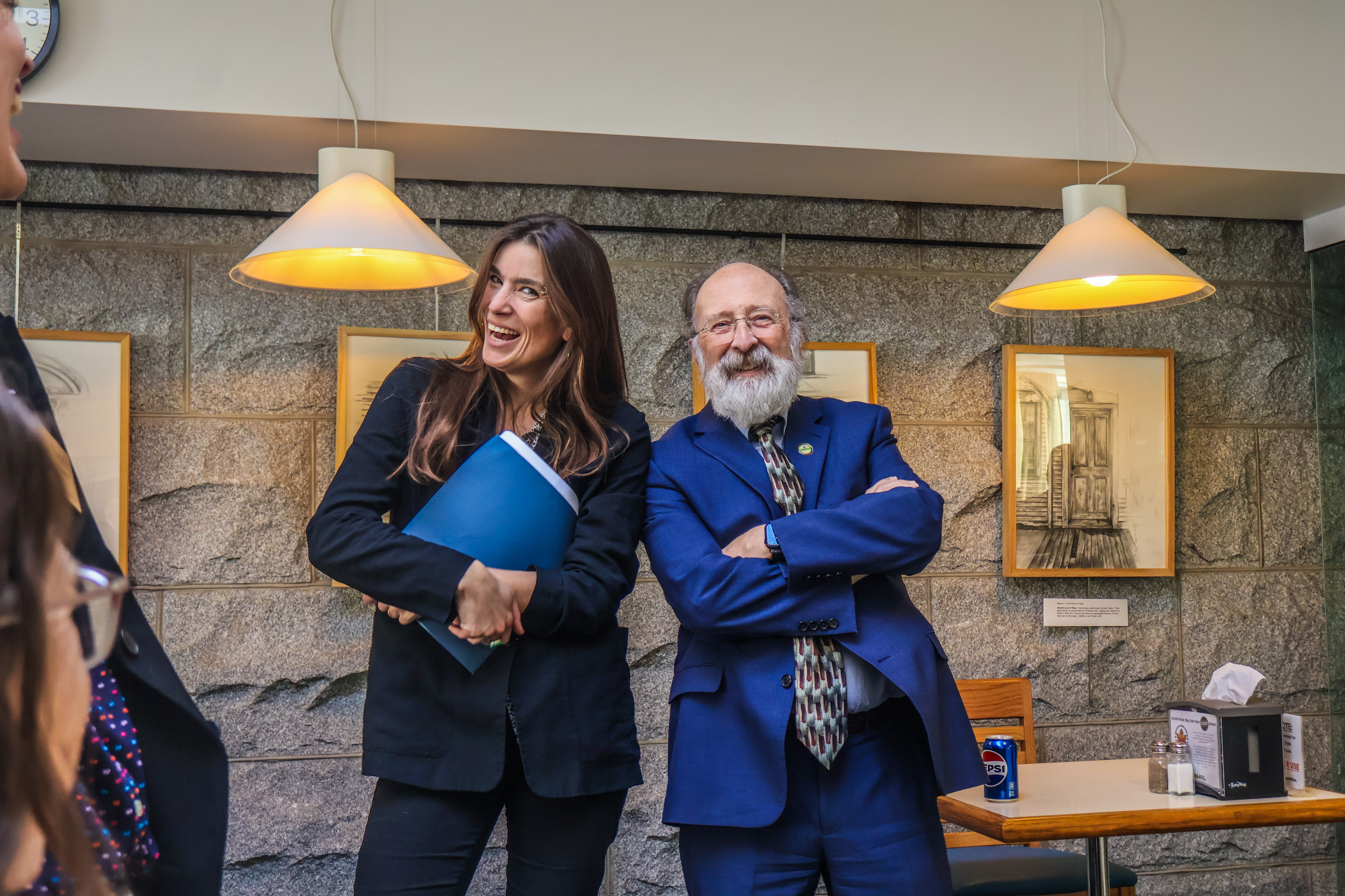 Grace Oedel, NOFA-VT Executive Director, stands with Vermont State Representative Bob Hooper in the State House cafeteria during an NOFA-VT Board Advocacy Day in the spring of 2025