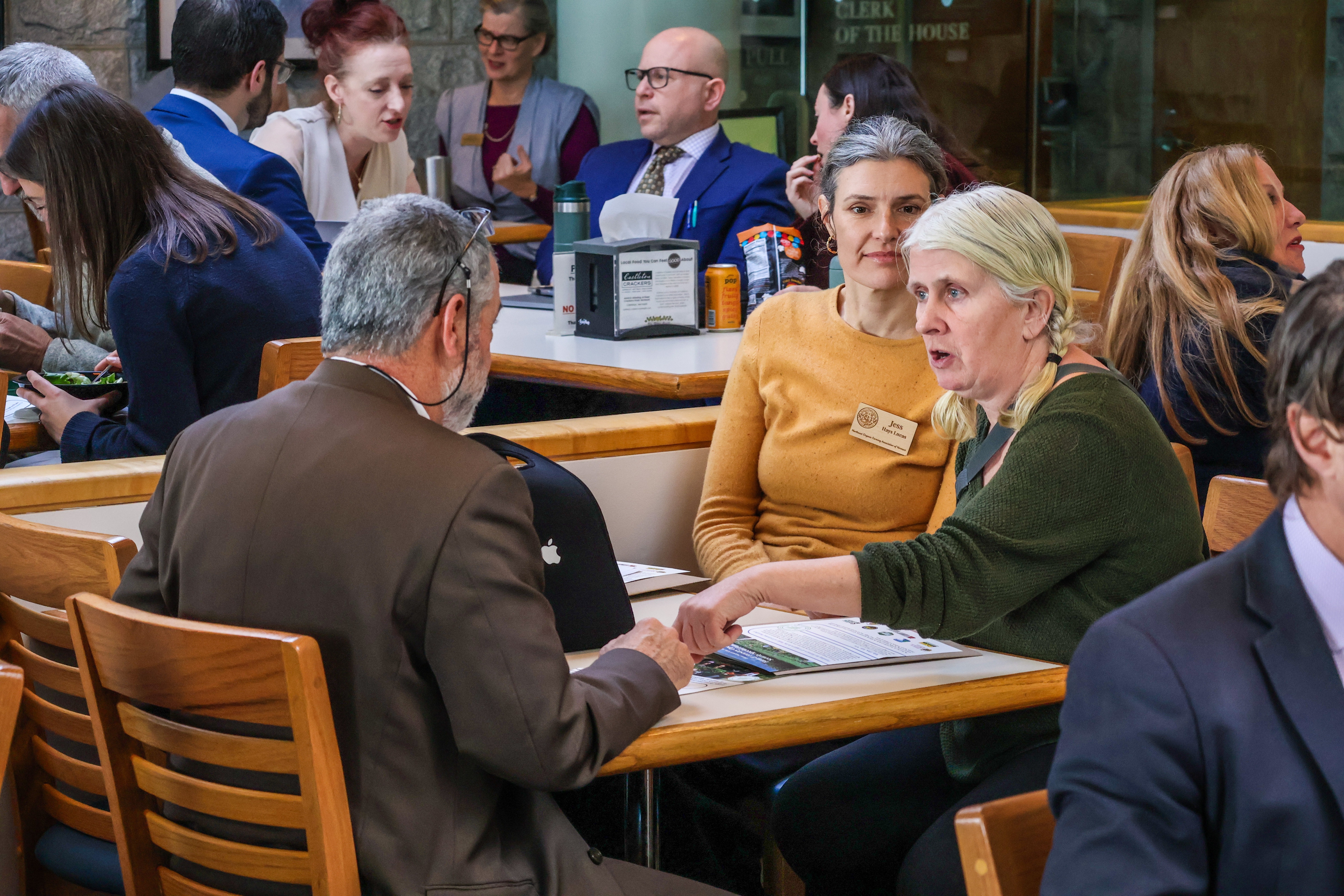 Margaret Loftus of Crossmolina Farm is shown advocating for NOFA-VT's Farm Security Fund with one of her elected officials as NOFA-VT Grassroots Organizer Jess Hays Lucas sits by her side in support
