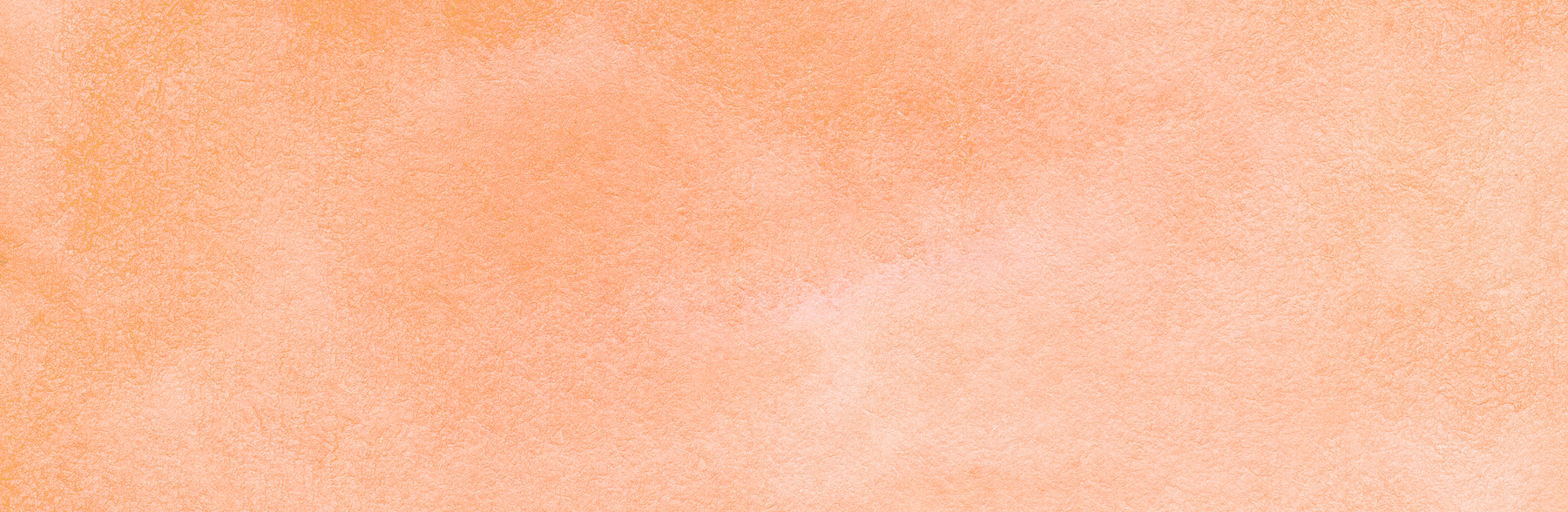 Wash of orange watercolor paint