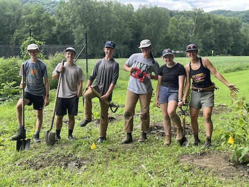 Teen Fellows & Educator in food justice garden