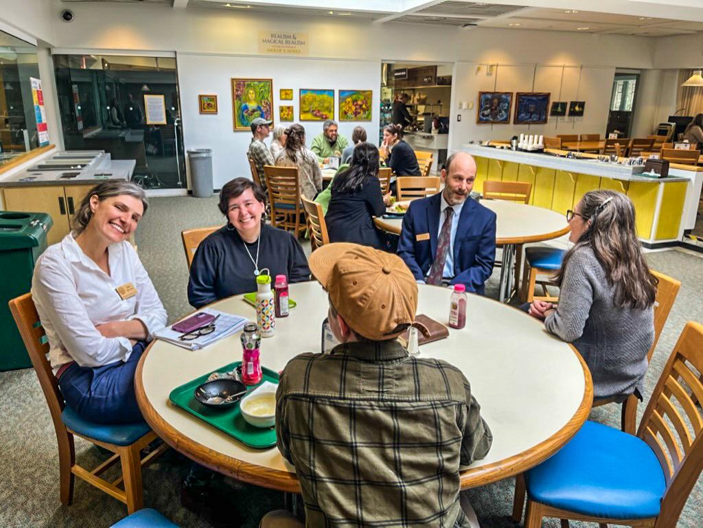 NOFA-VT Board Members, along with NOFA-VT Grassroots Organizer Jess Hays Lucas are pictured seated around a table in the State House cafeteria as part of a recent Board Advocacy Day