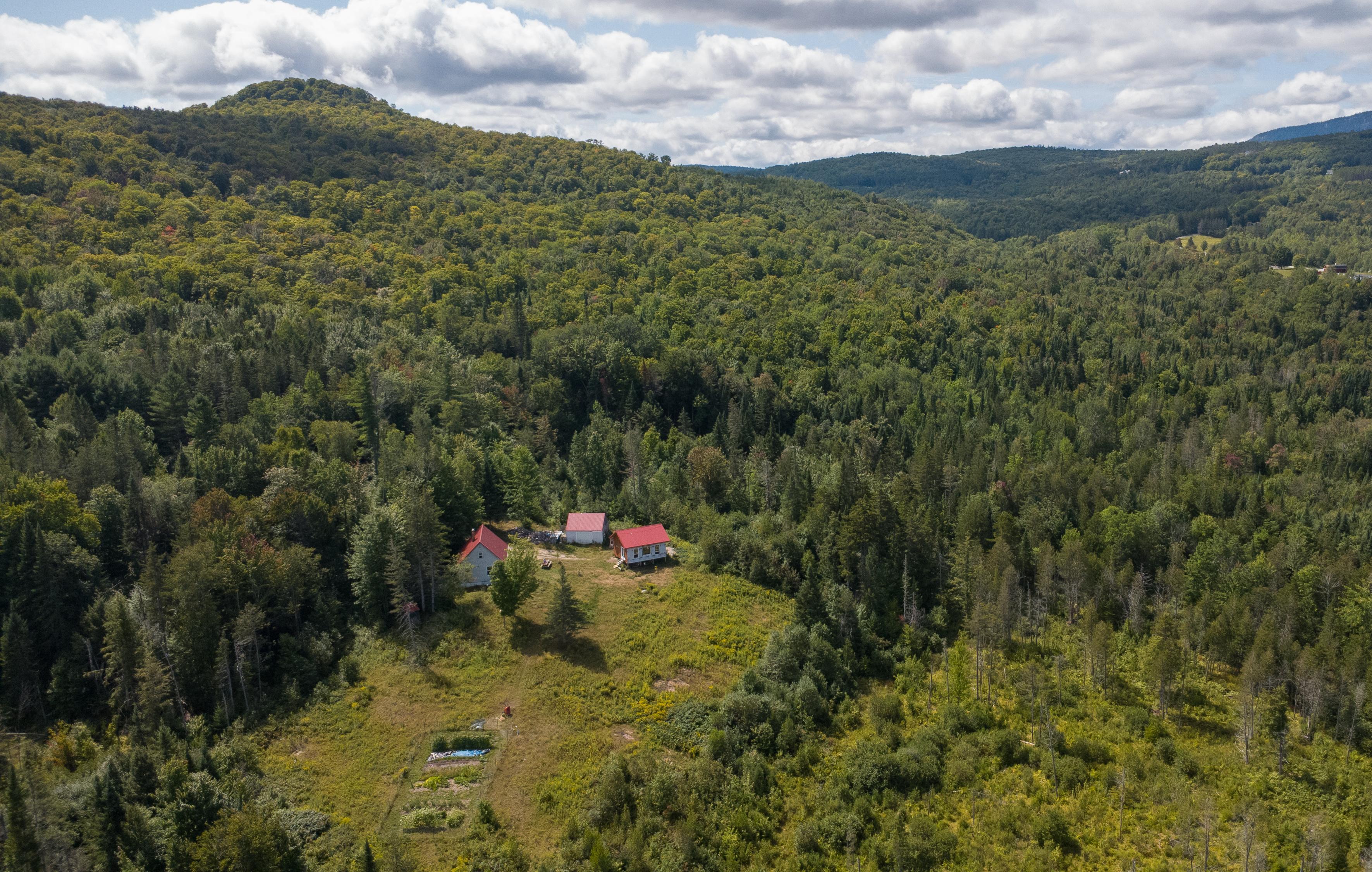 20 acres with garden and views