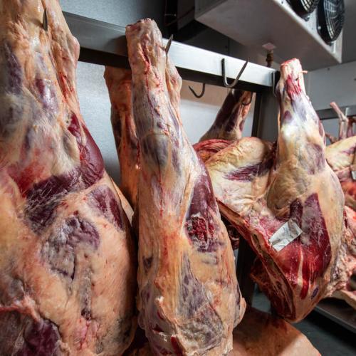 Meat hangs in a butchery
