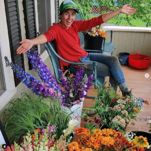 Jenny Monfore on her porch surrounded by bouquets from Old Time Flowers