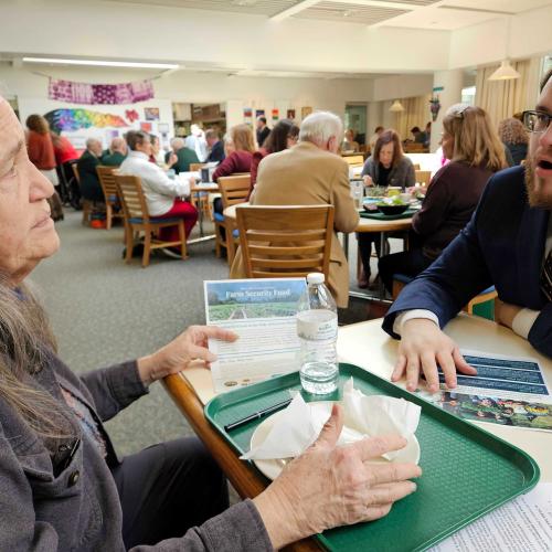 Peggy Newfield of Newfield Herb Farm meets with Senator Douglass in the Vermont State House cafeteria to urge his support for the Farm Security Fund