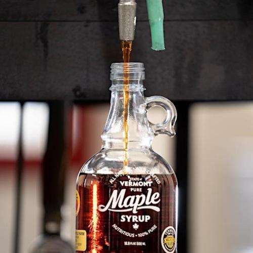 Maple Syrup pouring out of a tap