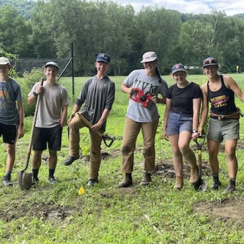 Teen Fellows & Educator in food justice garden