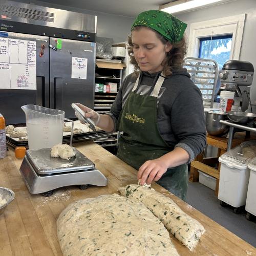 Baker making focaccia dough